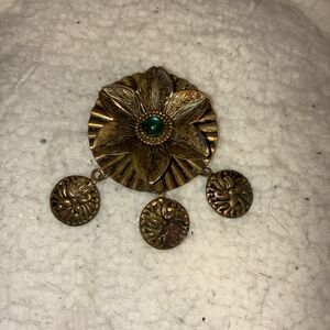Gold Floral Pendant with Green Accent